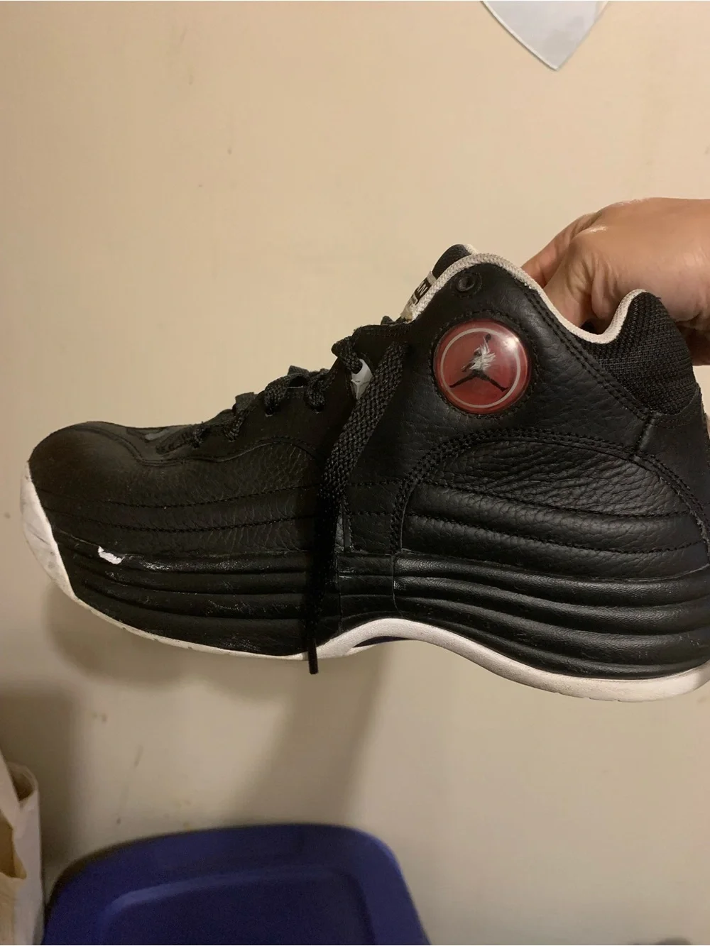 Jordan Black Sneakers with Red Jumpman Accent